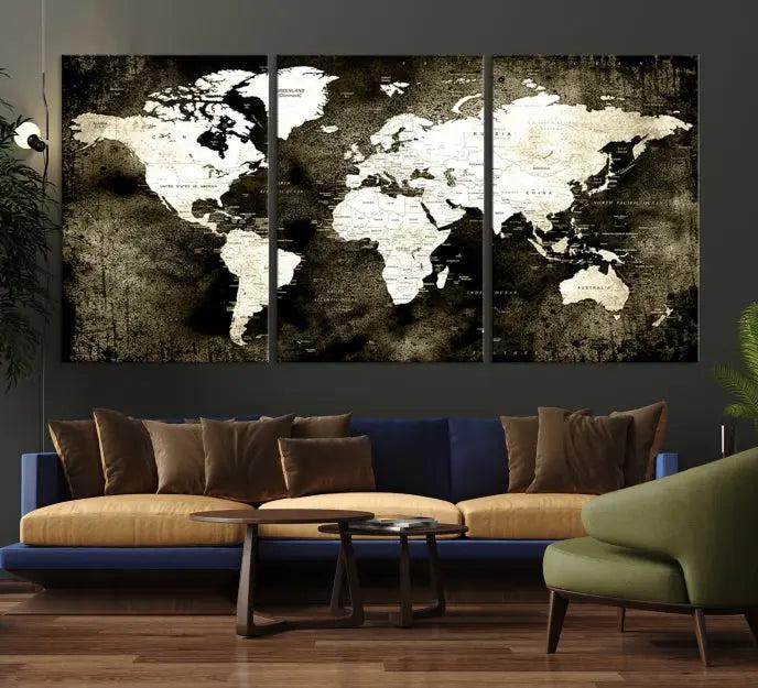 A gallery-wrapped, three-panel Push Pin World Map Canvas Print, crafted on museum-quality canvas, adorns the wall.