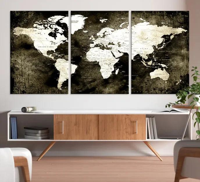 A gallery-wrapped, three-panel Push Pin World Map Canvas Print, crafted on museum-quality canvas, adorns the wall.