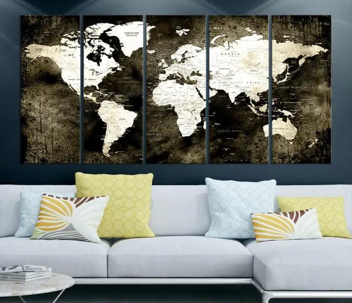 A gallery-wrapped, three-panel Push Pin World Map Canvas Print, crafted on museum-quality canvas, adorns the wall.