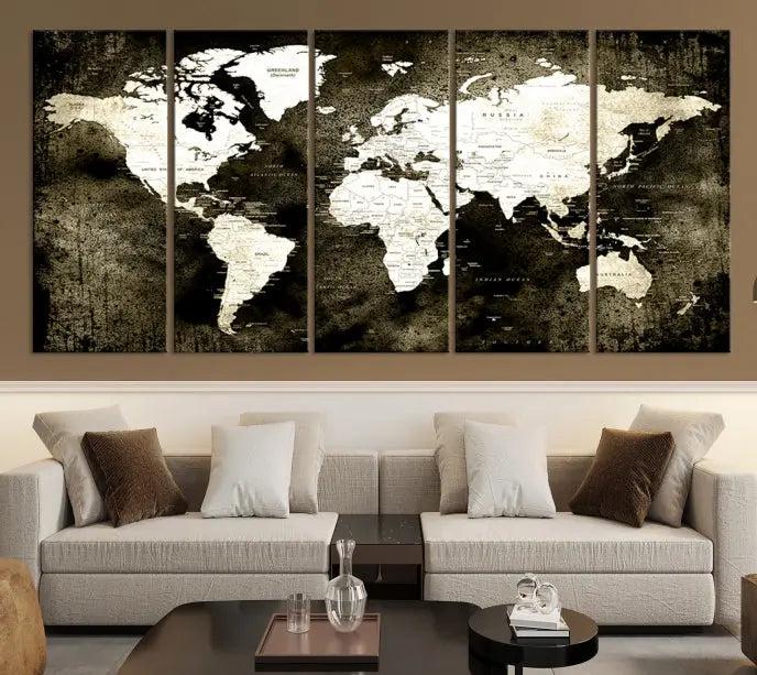 A gallery-wrapped, three-panel Push Pin World Map Canvas Print, crafted on museum-quality canvas, adorns the wall.