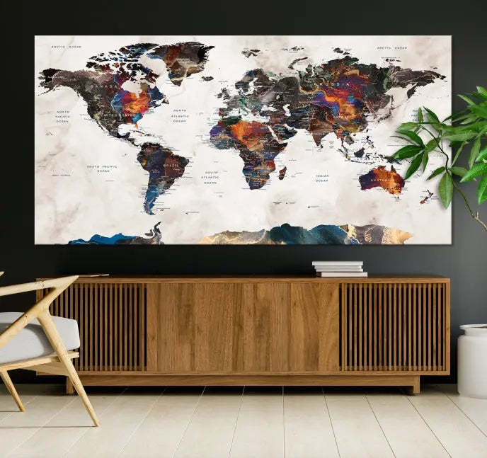 The Push Pin World Map Canvas Wall Art Print, crafted on museum-quality canvas with colorful regions, comes ready to hang and features a UV-protective coating to preserve its vibrant colors.