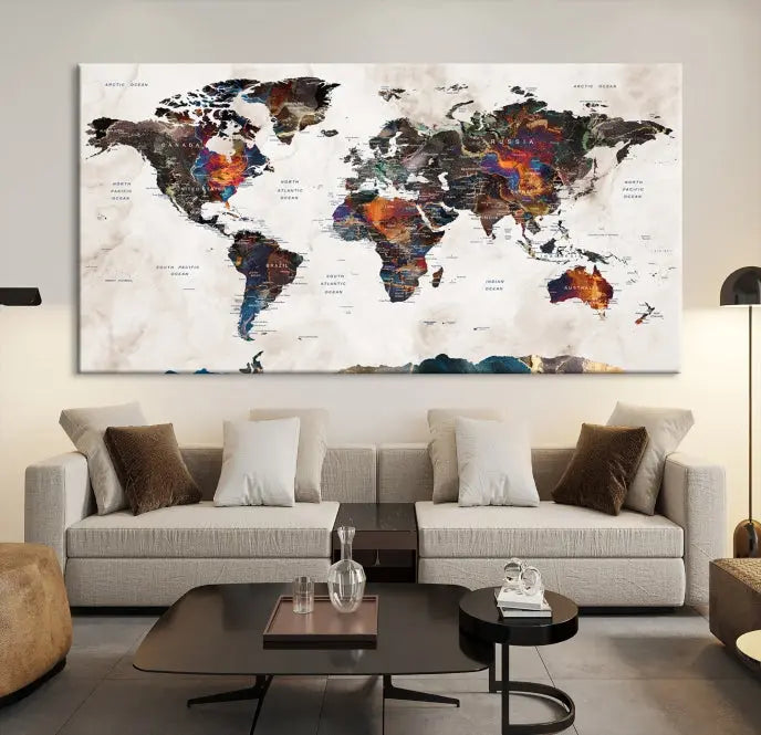 The Push Pin World Map Canvas Wall Art Print, crafted on museum-quality canvas with colorful regions, comes ready to hang and features a UV-protective coating to preserve its vibrant colors.