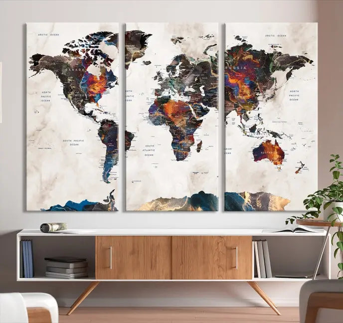 The Push Pin World Map Canvas Wall Art Print, crafted on museum-quality canvas with colorful regions, comes ready to hang and features a UV-protective coating to preserve its vibrant colors.