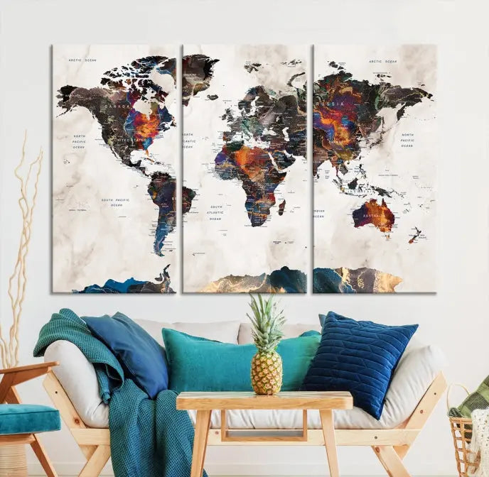 The Push Pin World Map Canvas Wall Art Print, crafted on museum-quality canvas with colorful regions, comes ready to hang and features a UV-protective coating to preserve its vibrant colors.