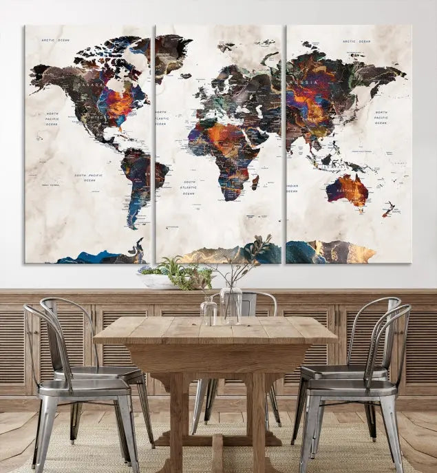 The Push Pin World Map Canvas Wall Art Print, crafted on museum-quality canvas with colorful regions, comes ready to hang and features a UV-protective coating to preserve its vibrant colors.