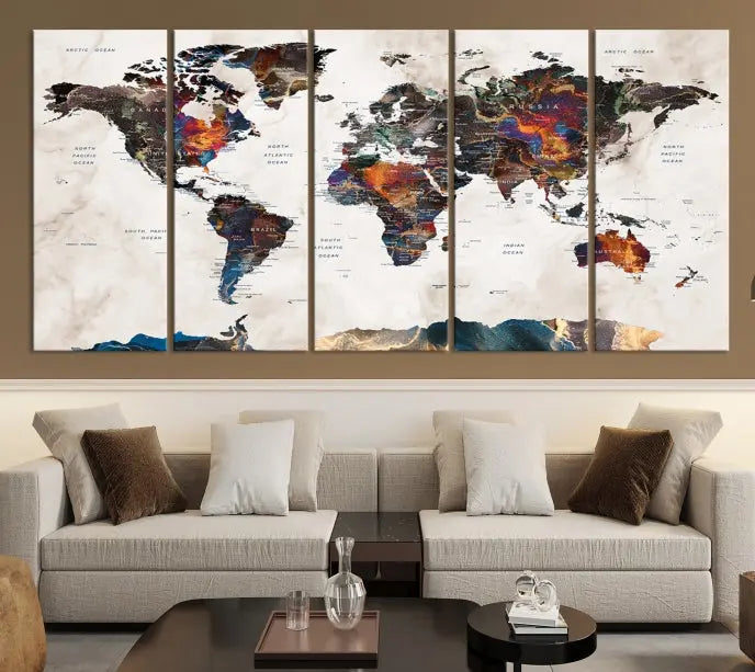 The Push Pin World Map Canvas Wall Art Print, crafted on museum-quality canvas with colorful regions, comes ready to hang and features a UV-protective coating to preserve its vibrant colors.