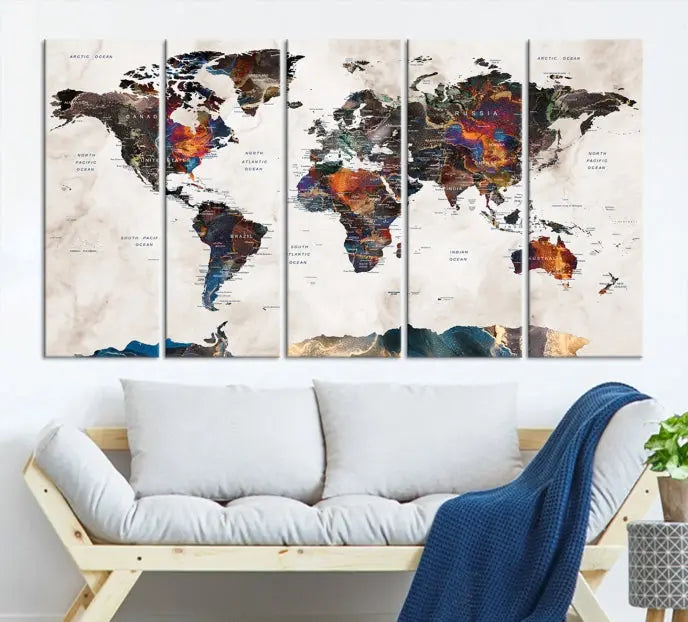 The Push Pin World Map Canvas Wall Art Print, crafted on museum-quality canvas with colorful regions, comes ready to hang and features a UV-protective coating to preserve its vibrant colors.