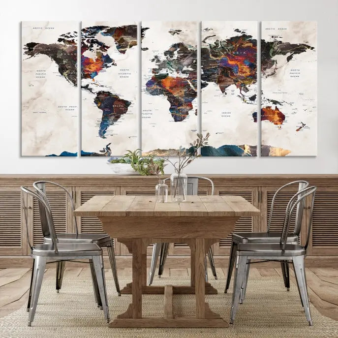 The Push Pin World Map Canvas Wall Art Print, crafted on museum-quality canvas with colorful regions, comes ready to hang and features a UV-protective coating to preserve its vibrant colors.