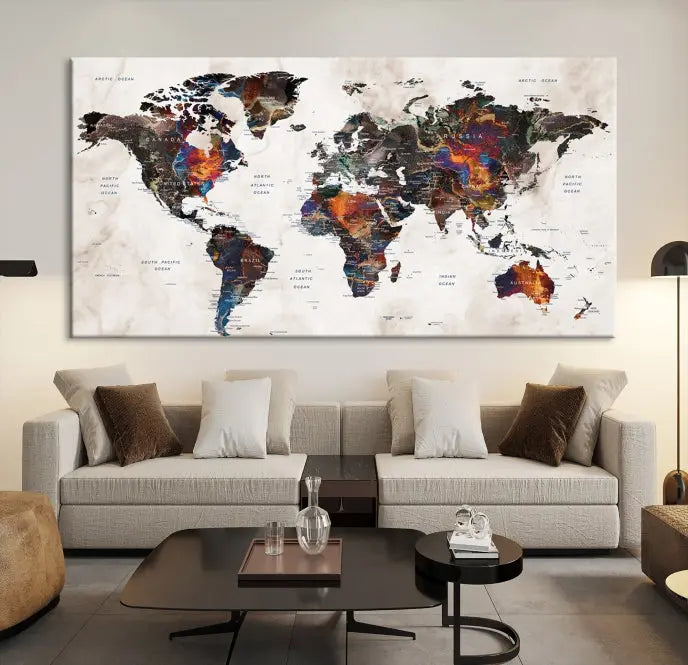 The "Push Pin World Map Painting Canvas Wall Art Print," a vibrant five-panel artwork with a gallery wrap and UV-protective coating, is displayed against a dark wall.