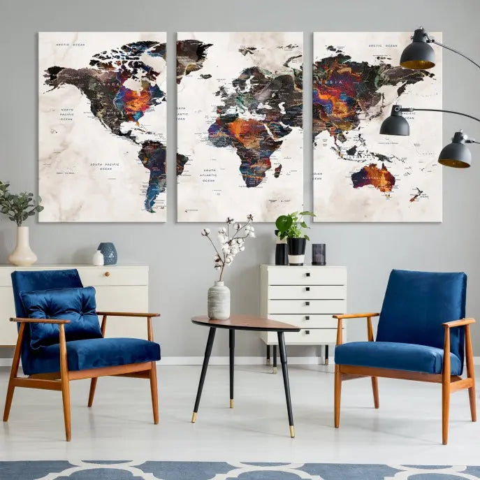 The "Push Pin World Map Painting Canvas Wall Art Print," a vibrant five-panel artwork with a gallery wrap and UV-protective coating, is displayed against a dark wall.