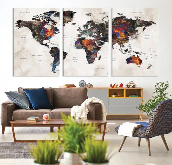 The "Push Pin World Map Painting Canvas Wall Art Print," a vibrant five-panel artwork with a gallery wrap and UV-protective coating, is displayed against a dark wall.