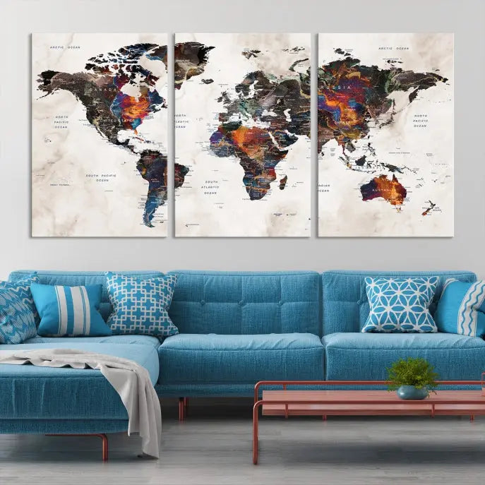 The "Push Pin World Map Painting Canvas Wall Art Print," a vibrant five-panel artwork with a gallery wrap and UV-protective coating, is displayed against a dark wall.