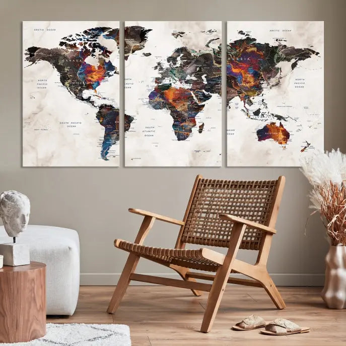 The "Push Pin World Map Painting Canvas Wall Art Print," a vibrant five-panel artwork with a gallery wrap and UV-protective coating, is displayed against a dark wall.