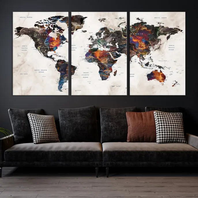 The "Push Pin World Map Painting Canvas Wall Art Print," a vibrant five-panel artwork with a gallery wrap and UV-protective coating, is displayed against a dark wall.