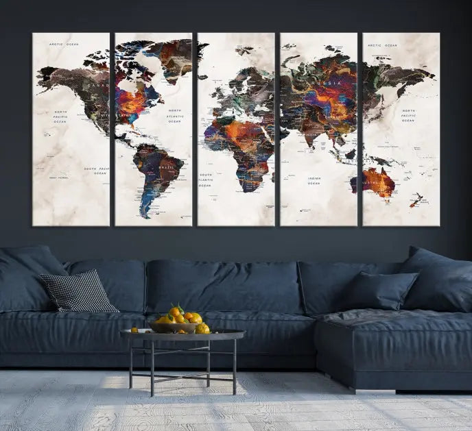 The "Push Pin World Map Painting Canvas Wall Art Print," a vibrant five-panel artwork with a gallery wrap and UV-protective coating, is displayed against a dark wall.