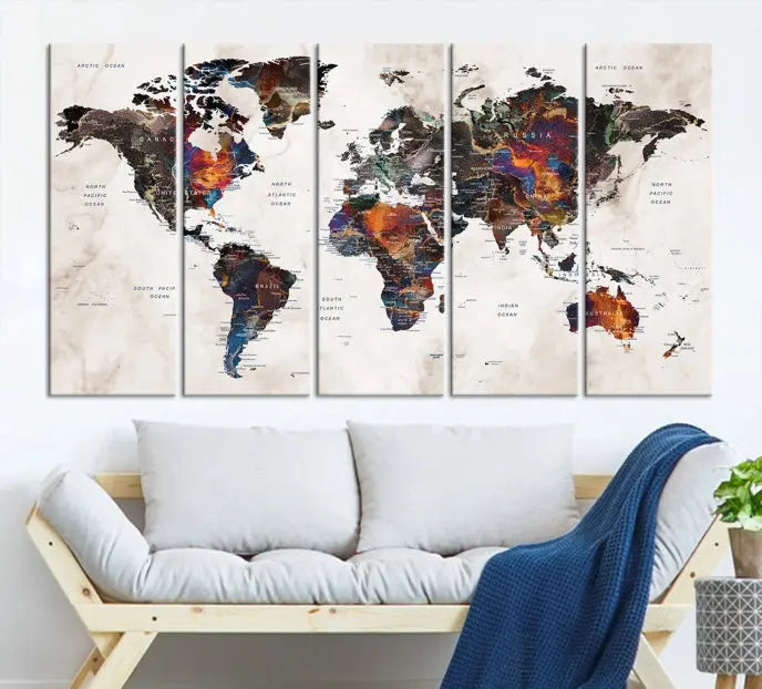 The "Push Pin World Map Painting Canvas Wall Art Print," a vibrant five-panel artwork with a gallery wrap and UV-protective coating, is displayed against a dark wall.