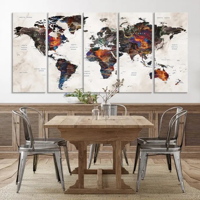 The "Push Pin World Map Painting Canvas Wall Art Print," a vibrant five-panel artwork with a gallery wrap and UV-protective coating, is displayed against a dark wall.