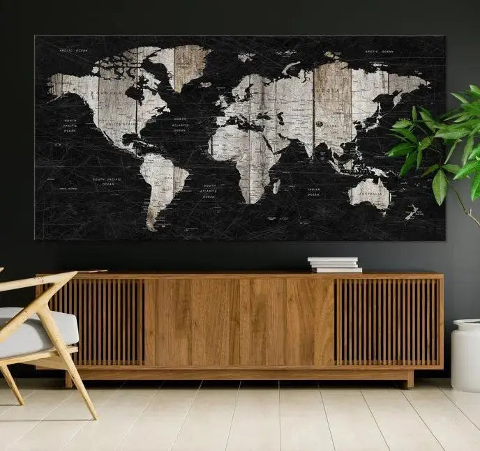 A Push Pin World Map Wall Art Canvas Print graces the wall, enhancing your decor effortlessly. The artwork arrives ready to hang, adding a touch of elegance to the space.