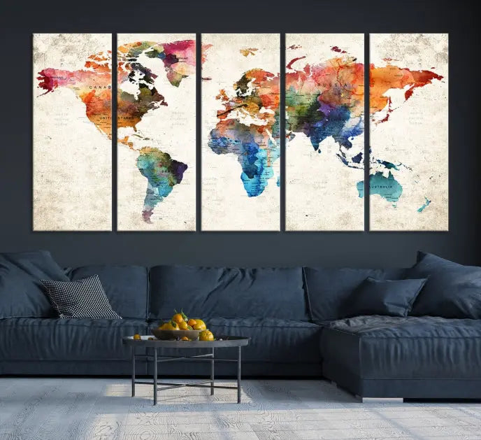 A Push Pin World Map Wall Art Canvas Print with a colorful abstract design and UV-protective coating is displayed on the wall.