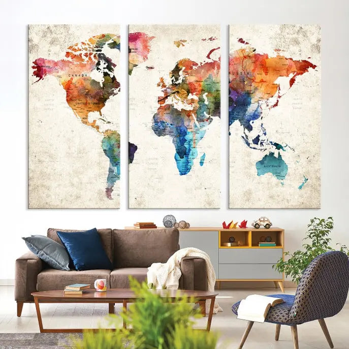 A Push Pin World Map Wall Art Canvas Print with a colorful abstract design and UV-protective coating is displayed on the wall.