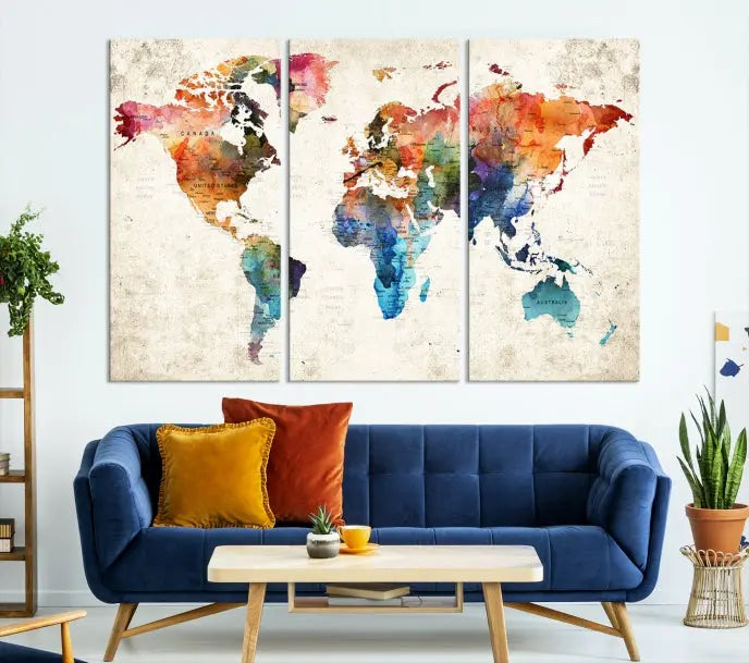 A Push Pin World Map Wall Art Canvas Print with a colorful abstract design and UV-protective coating is displayed on the wall.