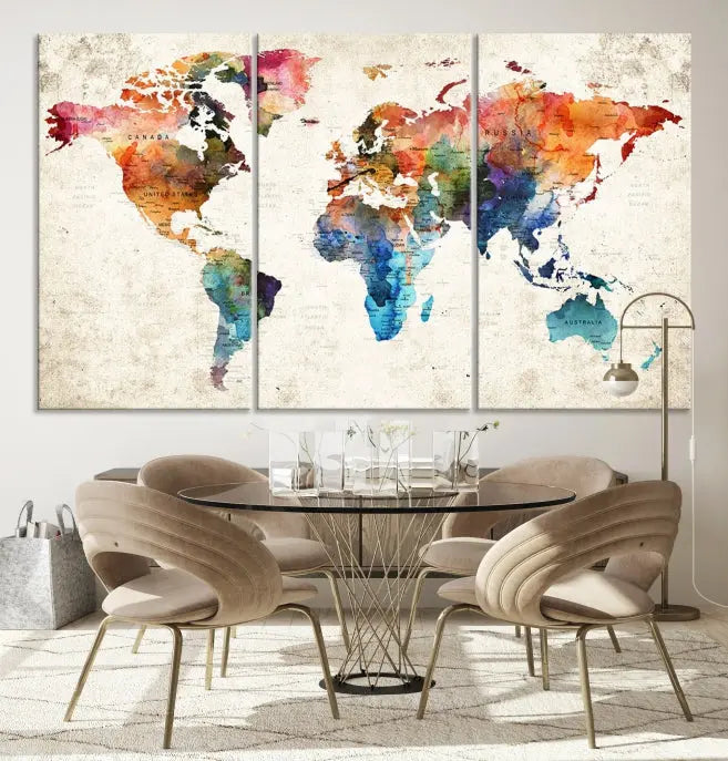 A Push Pin World Map Wall Art Canvas Print with a colorful abstract design and UV-protective coating is displayed on the wall.