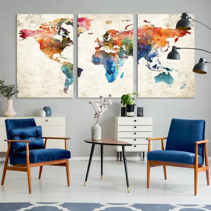 A Push Pin World Map Wall Art Canvas Print with a colorful abstract design and UV-protective coating is displayed on the wall.