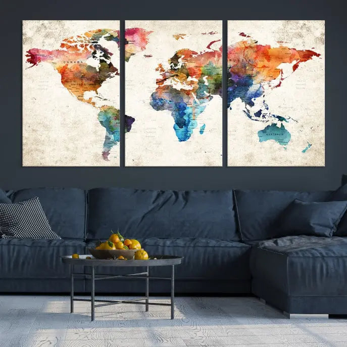 A Push Pin World Map Wall Art Canvas Print with a colorful abstract design and UV-protective coating is displayed on the wall.