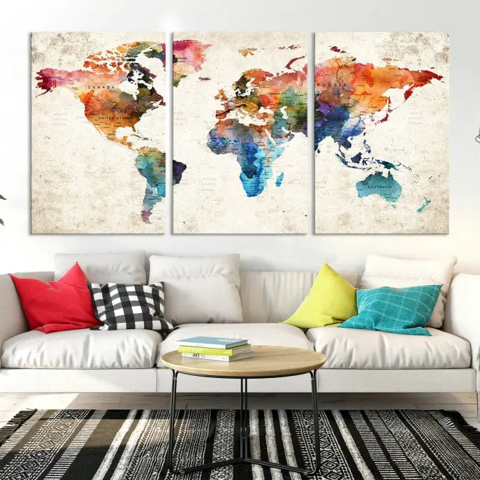 A Push Pin World Map Wall Art Canvas Print with a colorful abstract design and UV-protective coating is displayed on the wall.