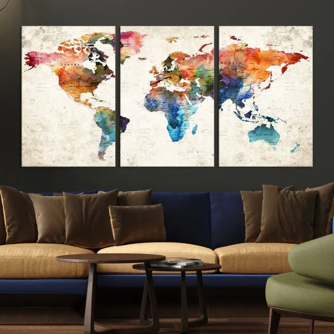 A Push Pin World Map Wall Art Canvas Print with a colorful abstract design and UV-protective coating is displayed on the wall.