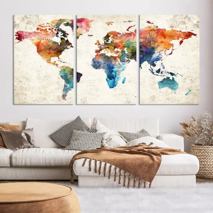 A Push Pin World Map Wall Art Canvas Print with a colorful abstract design and UV-protective coating is displayed on the wall.