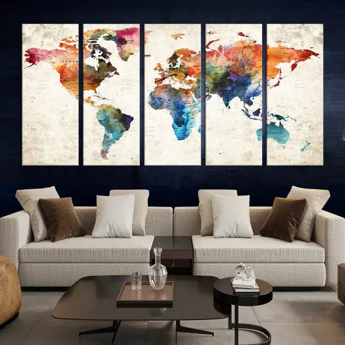 A Push Pin World Map Wall Art Canvas Print with a colorful abstract design and UV-protective coating is displayed on the wall.