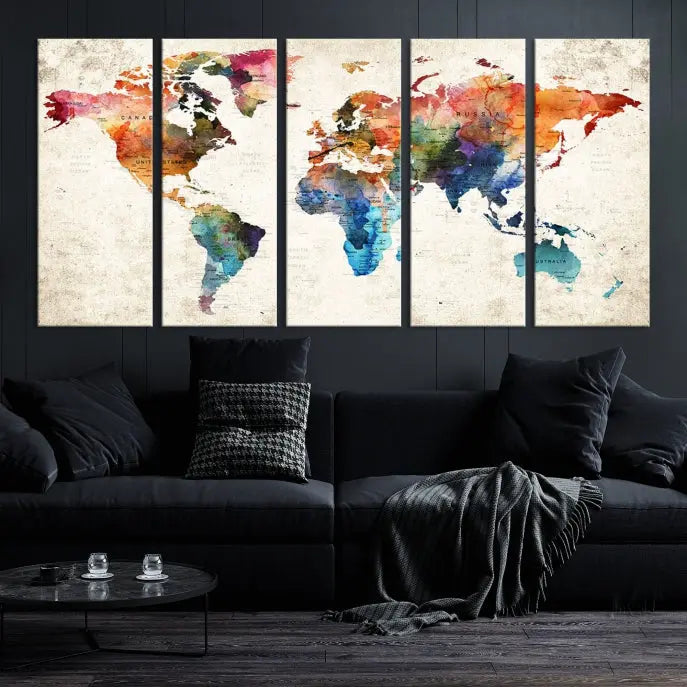 A Push Pin World Map Wall Art Canvas Print with a colorful abstract design and UV-protective coating is displayed on the wall.