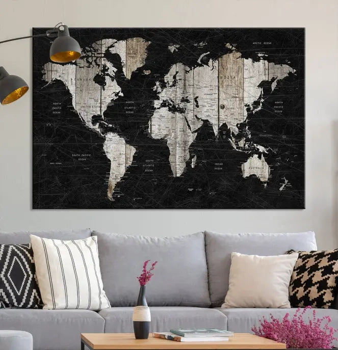 A Push Pin World Map Wall Art Canvas Print graces the wall, enhancing your decor effortlessly. The artwork arrives ready to hang, adding a touch of elegance to the space.