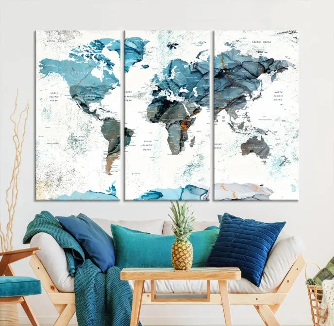 A modern living room showcases the Push Pin World Map Wall Art Canvas Print, crafted on museum-quality polycotton canvas, enhancing elegance and depth. The gallery-wrapped artwork creates an inviting space filled with charm.