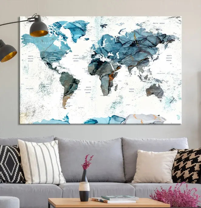 A modern living room showcases the Push Pin World Map Wall Art Canvas Print, crafted on museum-quality polycotton canvas, enhancing elegance and depth. The gallery-wrapped artwork creates an inviting space filled with charm.