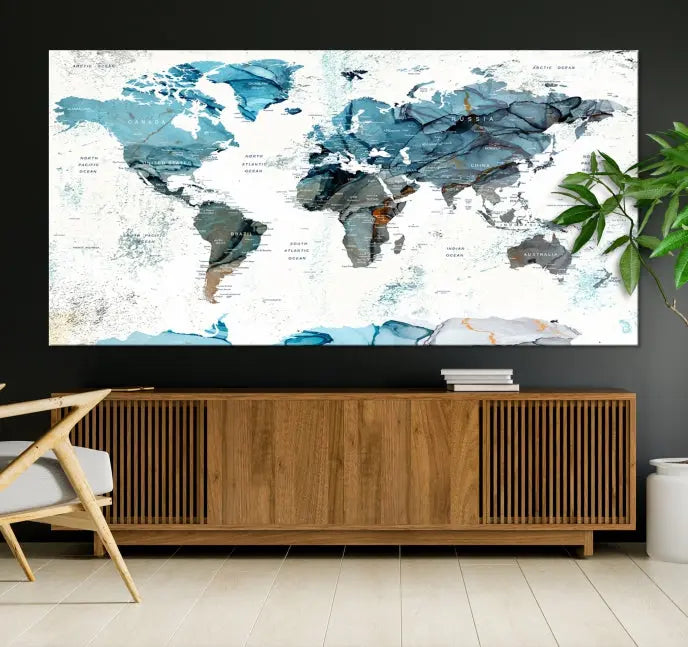 A modern living room showcases the Push Pin World Map Wall Art Canvas Print, crafted on museum-quality polycotton canvas, enhancing elegance and depth. The gallery-wrapped artwork creates an inviting space filled with charm.