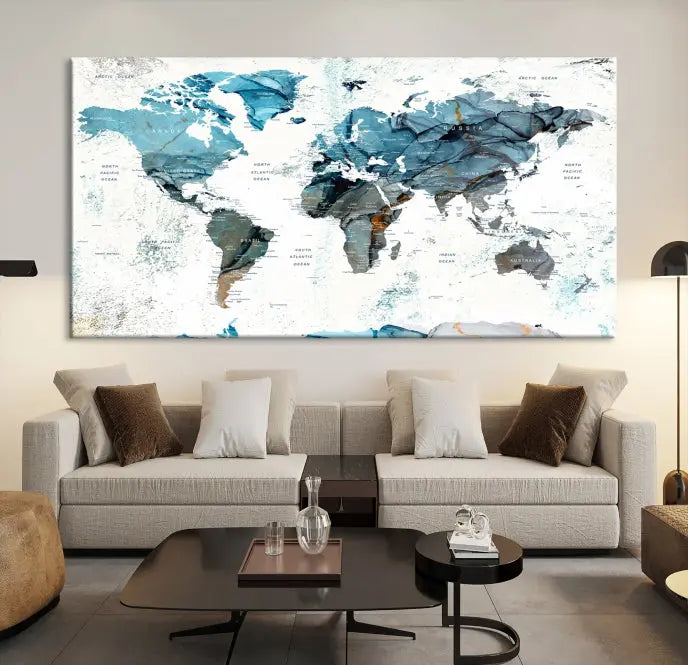 A modern living room showcases the Push Pin World Map Wall Art Canvas Print, crafted on museum-quality polycotton canvas, enhancing elegance and depth. The gallery-wrapped artwork creates an inviting space filled with charm.