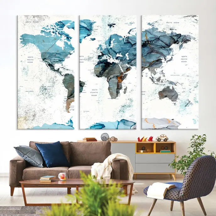 A modern living room showcases the Push Pin World Map Wall Art Canvas Print, crafted on museum-quality polycotton canvas, enhancing elegance and depth. The gallery-wrapped artwork creates an inviting space filled with charm.