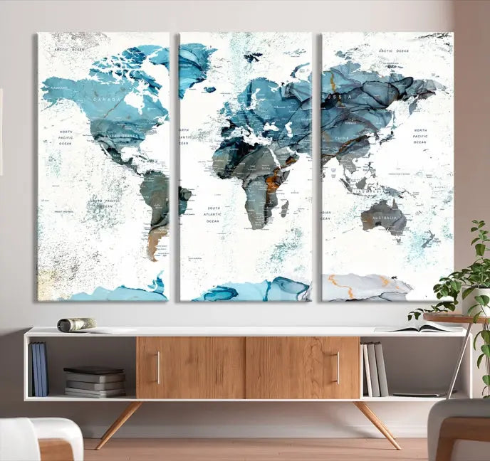 A modern living room showcases the Push Pin World Map Wall Art Canvas Print, crafted on museum-quality polycotton canvas, enhancing elegance and depth. The gallery-wrapped artwork creates an inviting space filled with charm.