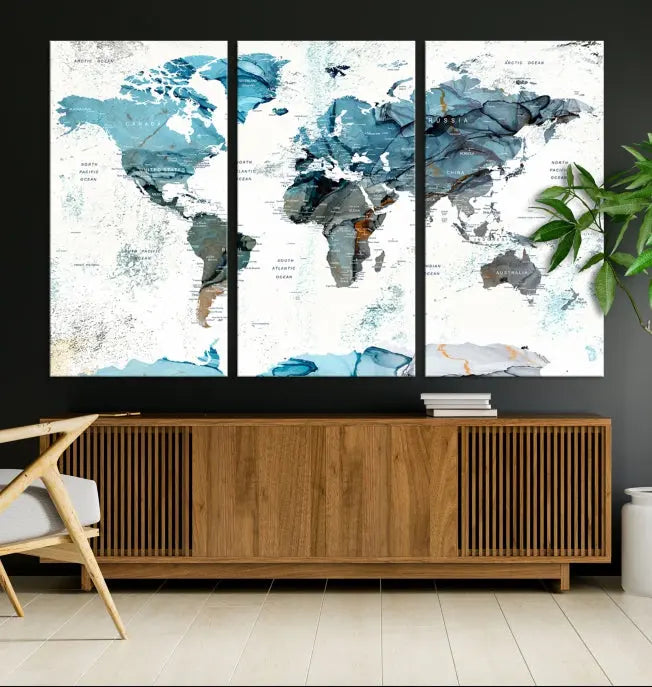 A modern living room showcases the Push Pin World Map Wall Art Canvas Print, crafted on museum-quality polycotton canvas, enhancing elegance and depth. The gallery-wrapped artwork creates an inviting space filled with charm.