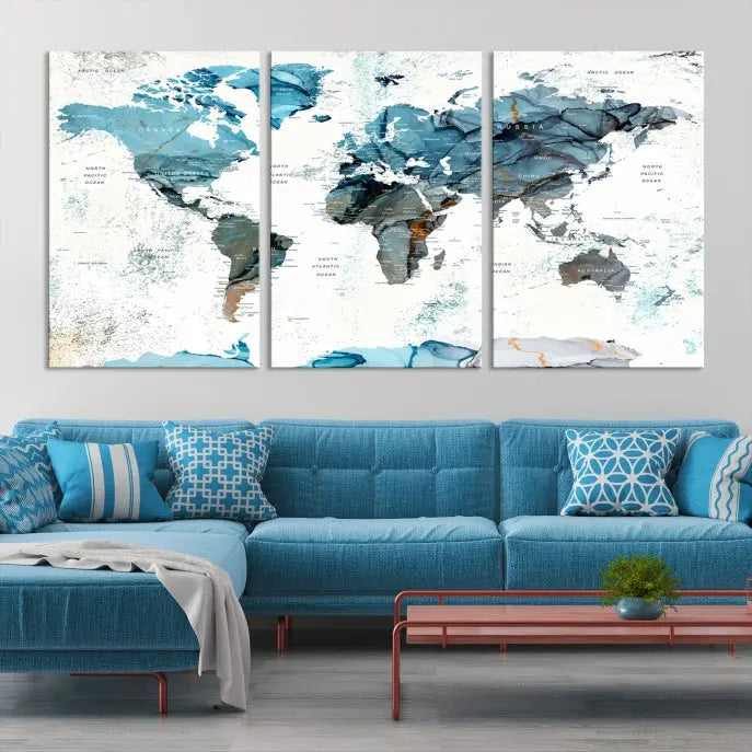 A modern living room showcases the Push Pin World Map Wall Art Canvas Print, crafted on museum-quality polycotton canvas, enhancing elegance and depth. The gallery-wrapped artwork creates an inviting space filled with charm.