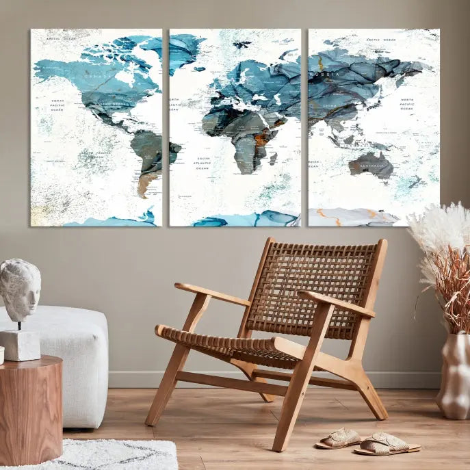 A modern living room showcases the Push Pin World Map Wall Art Canvas Print, crafted on museum-quality polycotton canvas, enhancing elegance and depth. The gallery-wrapped artwork creates an inviting space filled with charm.