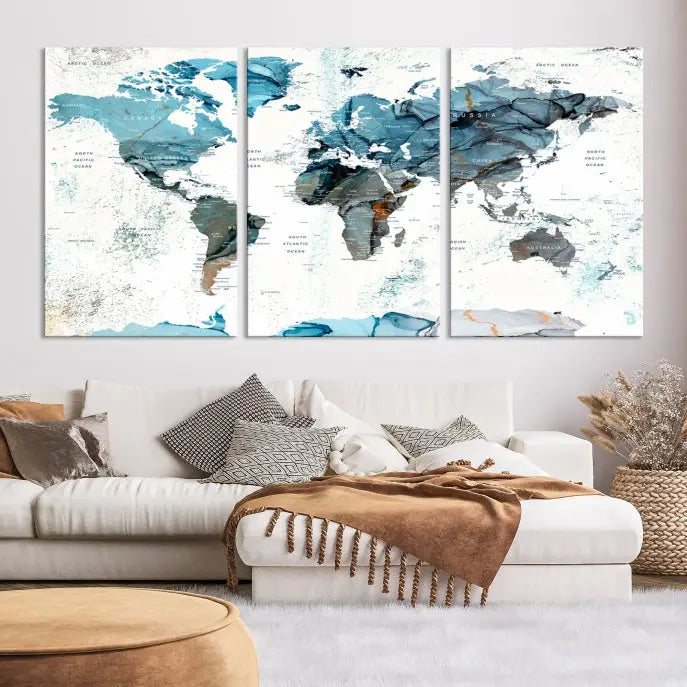 A modern living room showcases the Push Pin World Map Wall Art Canvas Print, crafted on museum-quality polycotton canvas, enhancing elegance and depth. The gallery-wrapped artwork creates an inviting space filled with charm.