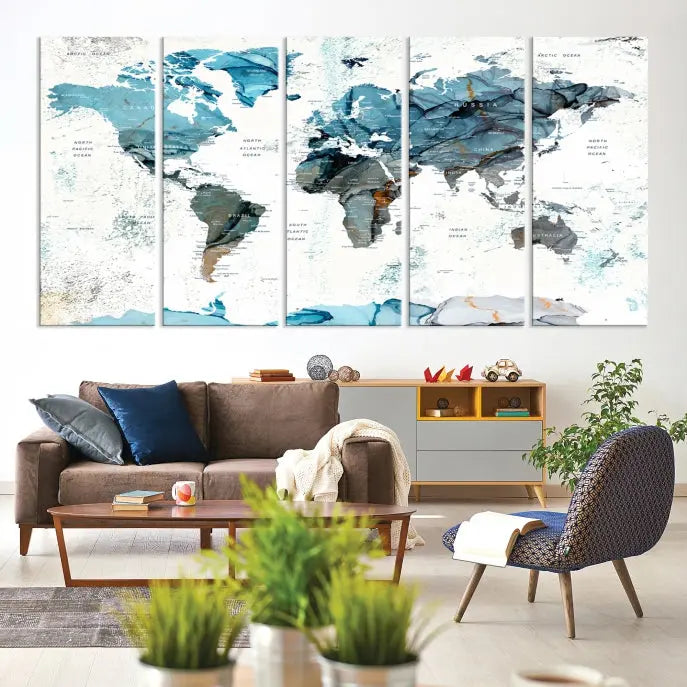 A modern living room showcases the Push Pin World Map Wall Art Canvas Print, crafted on museum-quality polycotton canvas, enhancing elegance and depth. The gallery-wrapped artwork creates an inviting space filled with charm.