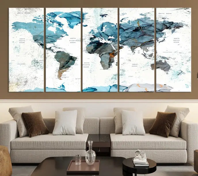 A modern living room showcases the Push Pin World Map Wall Art Canvas Print, crafted on museum-quality polycotton canvas, enhancing elegance and depth. The gallery-wrapped artwork creates an inviting space filled with charm.