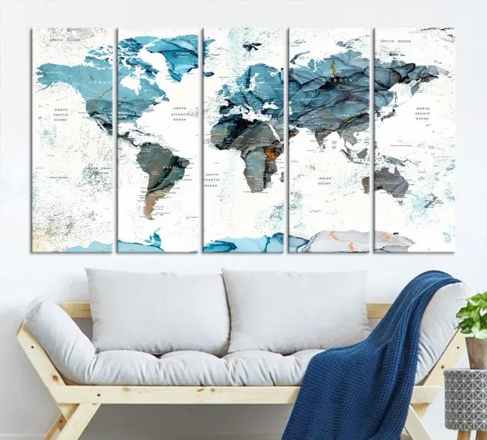 A modern living room showcases the Push Pin World Map Wall Art Canvas Print, crafted on museum-quality polycotton canvas, enhancing elegance and depth. The gallery-wrapped artwork creates an inviting space filled with charm.