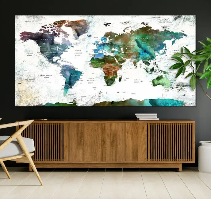 A Push Pin World Map Wall Art Canvas Print, featuring watercolor hues and enhanced with a UV-protective coating for long-lasting vibrant colors, hangs prominently.