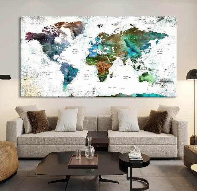 A Push Pin World Map Wall Art Canvas Print, featuring watercolor hues and enhanced with a UV-protective coating for long-lasting vibrant colors, hangs prominently.