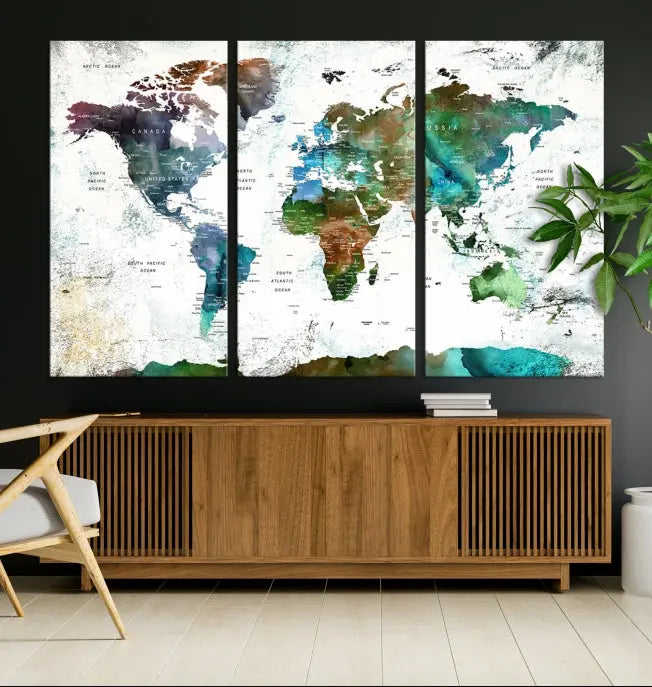 A Push Pin World Map Wall Art Canvas Print, featuring watercolor hues and enhanced with a UV-protective coating for long-lasting vibrant colors, hangs prominently.